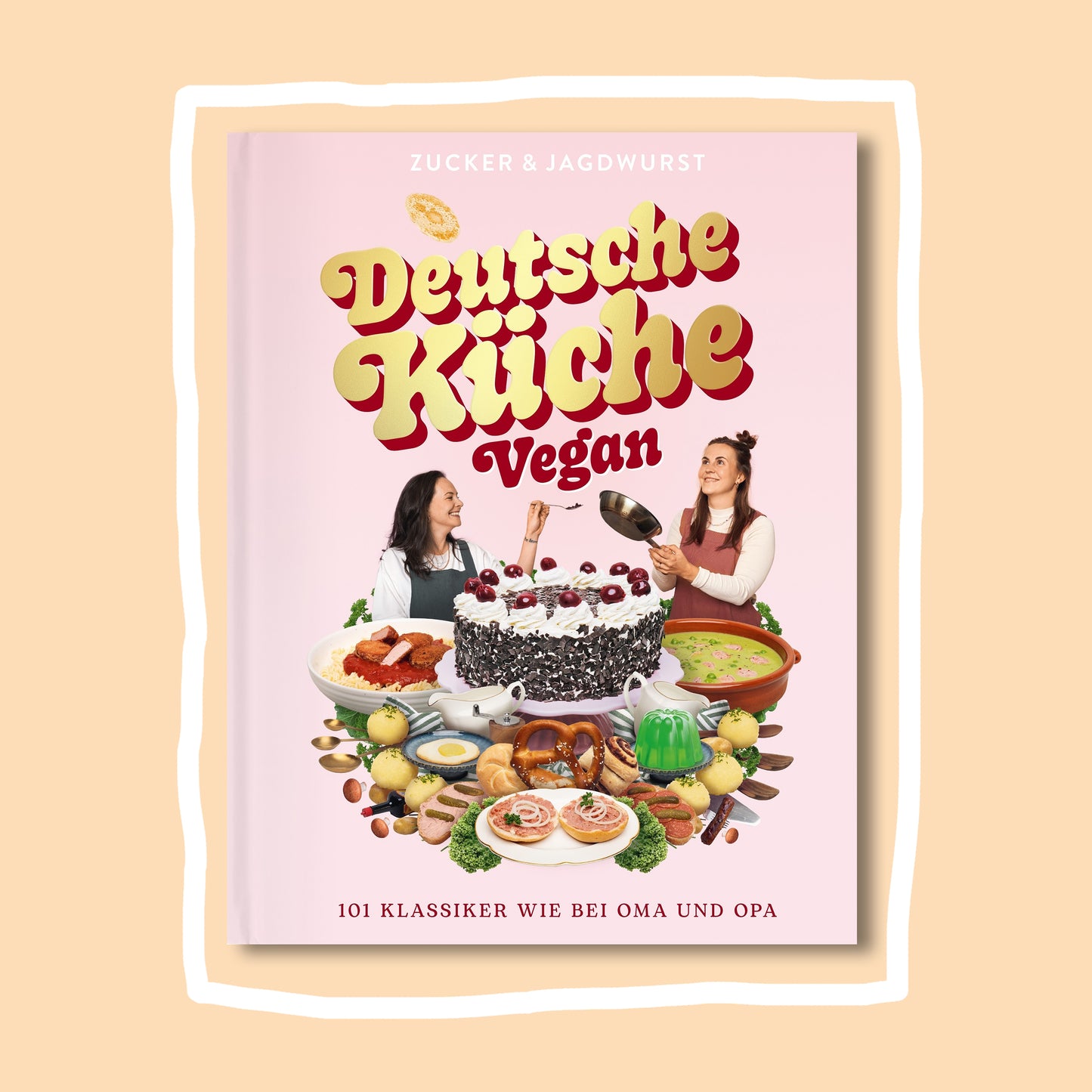 Kochbuch “Deutsche Küche Vegan” auf beigem Hintergrund mit weißer Umrandung
